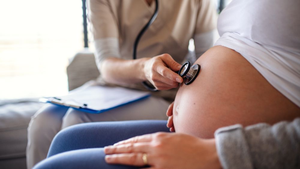 Doctor Checking Blood Pressure And Measuring The Baby Bump - NRKSS Blog